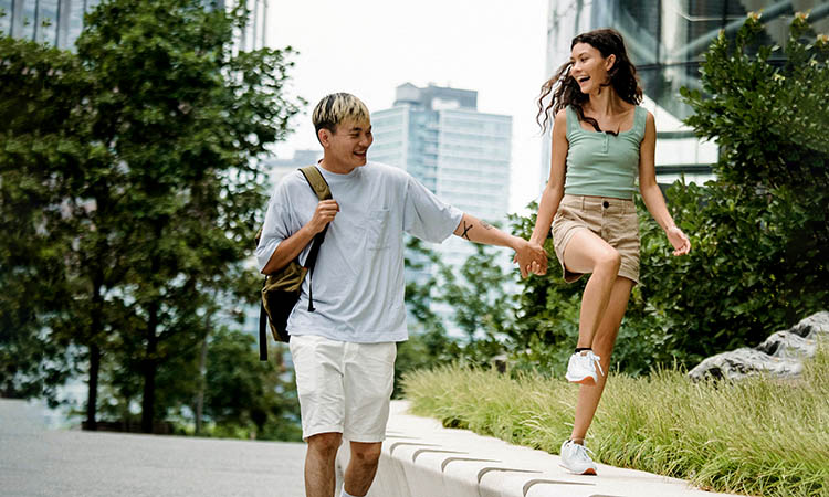 A loving couple walking down the street